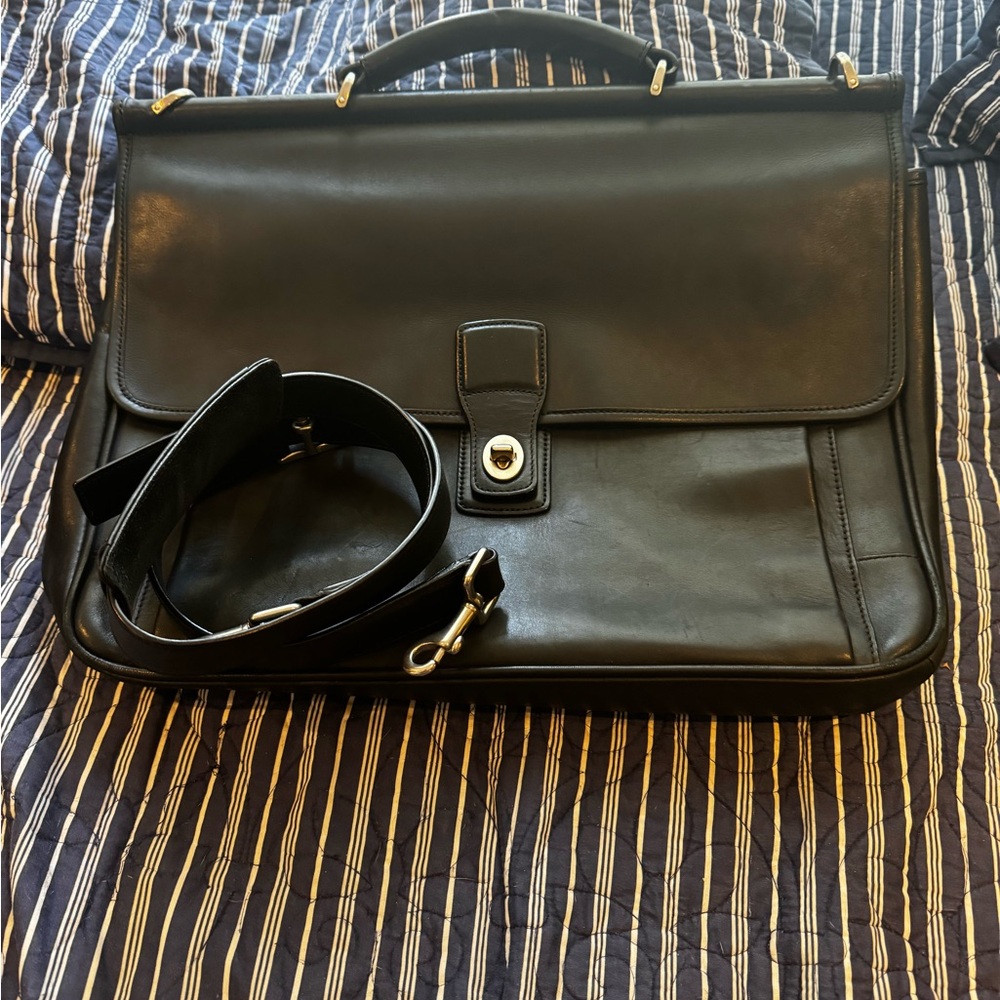Classic Coach leather briefcase black with silver accents men’s / women’s.
